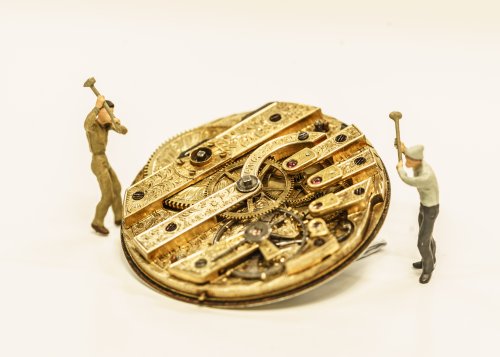 Workmen working on the watch